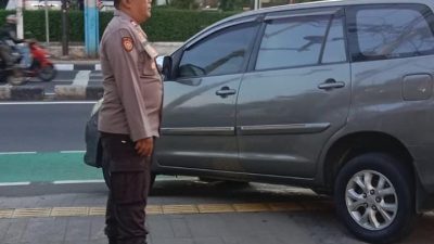 Sasar Titik Rawan Kejahatan, Aiptu Ali Imran Melaksanakan Pengaturan Lalin Depan Kolose Kanisius