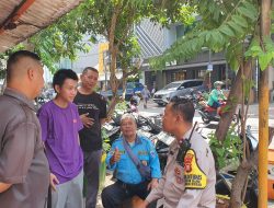 Bhabinkamtibmas Lakukan Patroli Dialogis di Area Parkir Pusat Perekonomian Pasar Baru